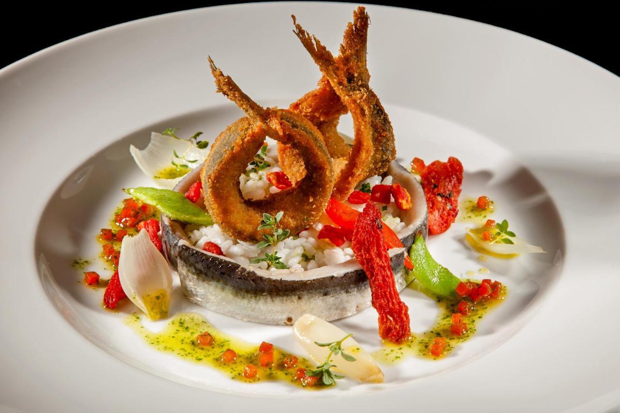 Palace Hotel Do Bussaco Luso  Luaran gambar A dish of fried fish